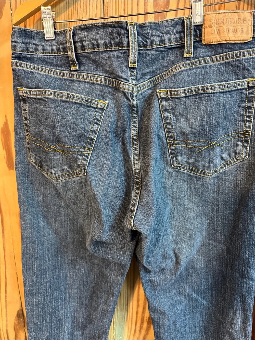Men's Classic signature Levi Strauss boot cut Fit med Blue Jeans 34x34